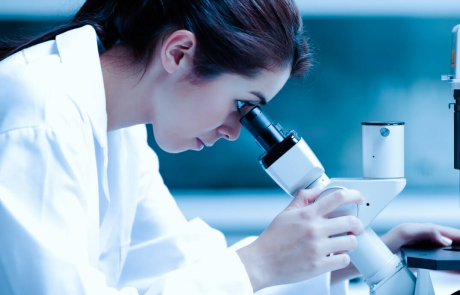 Blog Researcher Woman Using Microscope Lab
