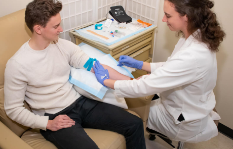 Blog BRI Researcher Woman Participant Man Blood Draw