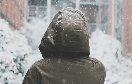 Blog Woman Facing Snowy City