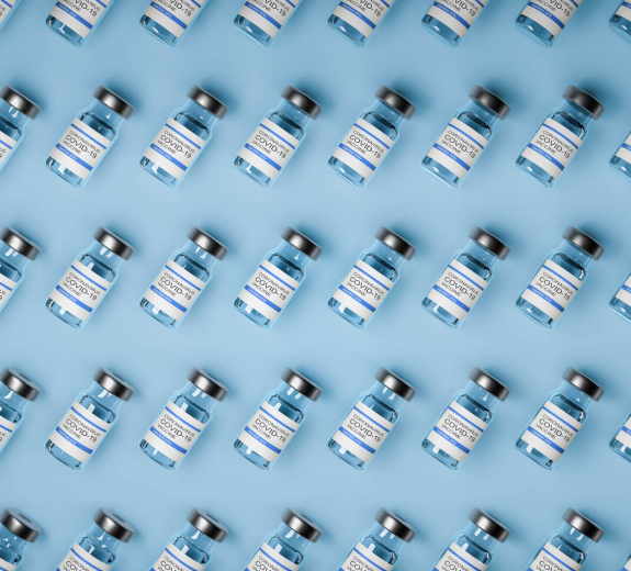 Blog Main Image - 3D Vaccine Bottles Arranged Grid Blue