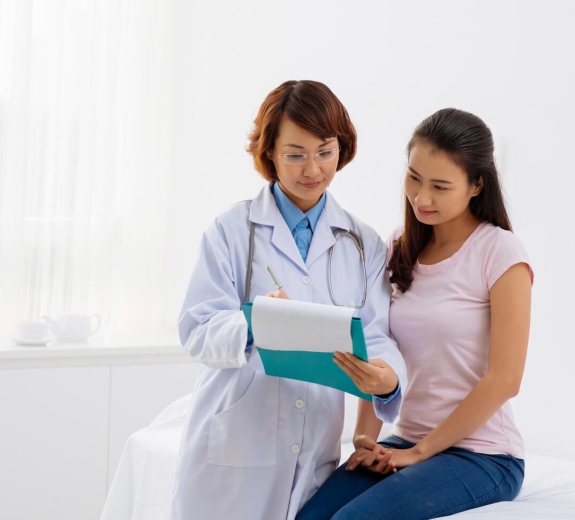 Blog Main Image - Clinician Woman Talking Patient Woman 3