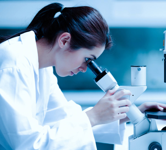 Blog Main Image - Researcher Woman Using Microscope Lab