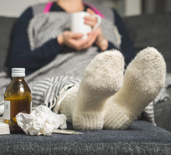 Blog Woman Sick Cold Medicine Couch