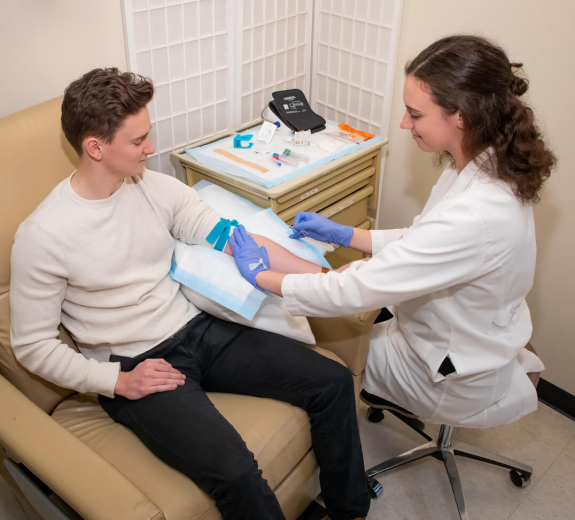 Blog BRI Researcher Woman Participant Man Blood Draw