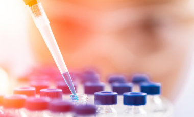 Blog Researcher Woman Pipetting Samples Blue