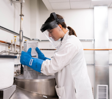 Scientist moving samples in BRI's biorepositories
